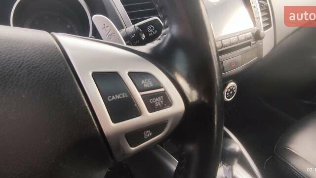 Бежевый Мицубиси Аутлендер, объемом двигателя 2.36 л и пробегом 200 тыс. км за 8300 $, фото 19 на Automoto.ua