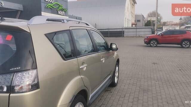 Бежевый Мицубиси Аутлендер, объемом двигателя 2.36 л и пробегом 200 тыс. км за 8300 $, фото 12 на Automoto.ua