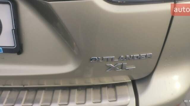 Бежевый Мицубиси Аутлендер, объемом двигателя 2.36 л и пробегом 200 тыс. км за 8300 $, фото 14 на Automoto.ua