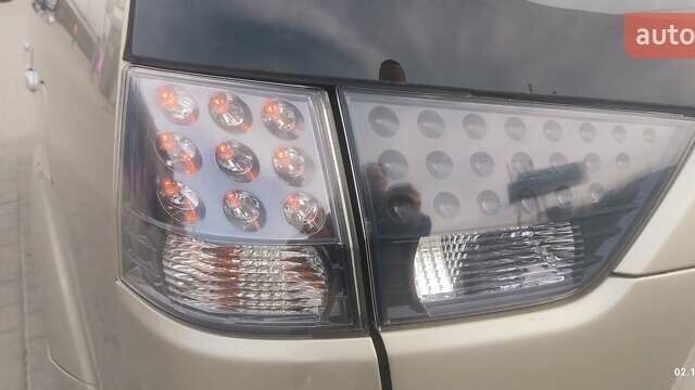 Бежевый Мицубиси Аутлендер, объемом двигателя 2.36 л и пробегом 200 тыс. км за 8300 $, фото 15 на Automoto.ua