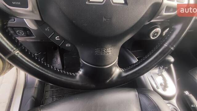 Бежевый Мицубиси Аутлендер, объемом двигателя 2.36 л и пробегом 200 тыс. км за 8300 $, фото 20 на Automoto.ua