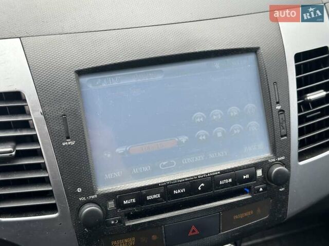 Бежевый Мицубиси Аутлендер, объемом двигателя 2.4 л и пробегом 241 тыс. км за 8990 $, фото 23 на Automoto.ua