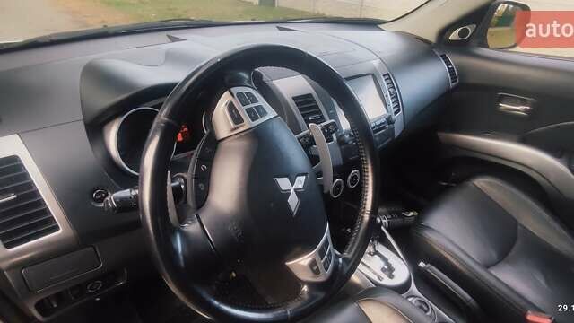 Бежевий Міцубісі Аутлендер, об'ємом двигуна 2.36 л та пробігом 240 тис. км за 9250 $, фото 2 на Automoto.ua