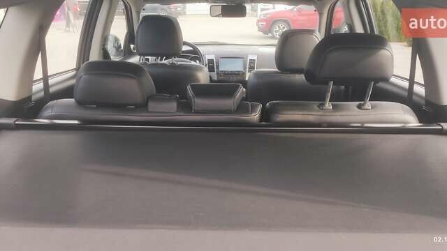 Бежевый Мицубиси Аутлендер, объемом двигателя 2.36 л и пробегом 200 тыс. км за 8300 $, фото 35 на Automoto.ua