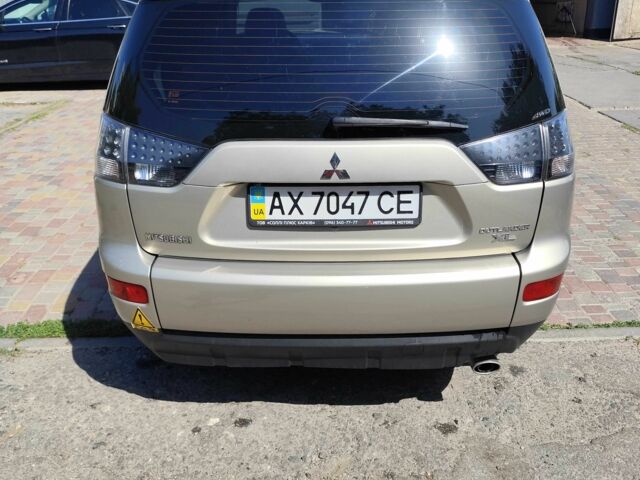 Бежевий Міцубісі Аутлендер, об'ємом двигуна 2.4 л та пробігом 281 тис. км за 8500 $, фото 5 на Automoto.ua