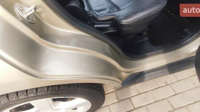 Бежевый Мицубиси Аутлендер, объемом двигателя 2.36 л и пробегом 200 тыс. км за 8300 $, фото 48 на Automoto.ua