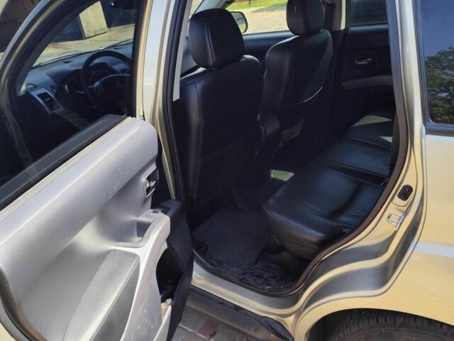 Бежевий Міцубісі Аутлендер, об'ємом двигуна 2.4 л та пробігом 281 тис. км за 8500 $, фото 10 на Automoto.ua