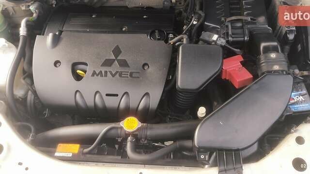 Бежевый Мицубиси Аутлендер, объемом двигателя 2.36 л и пробегом 200 тыс. км за 8300 $, фото 50 на Automoto.ua