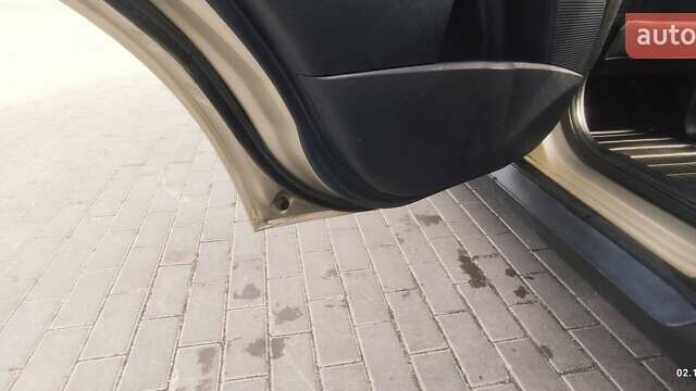 Бежевый Мицубиси Аутлендер, объемом двигателя 2.36 л и пробегом 200 тыс. км за 8300 $, фото 44 на Automoto.ua