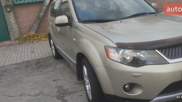 Бежевий Міцубісі Аутлендер, об'ємом двигуна 2.36 л та пробігом 190 тис. км за 9700 $, фото 12 на Automoto.ua