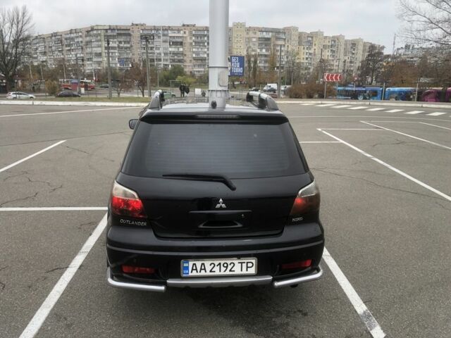Чорний Міцубісі Аутлендер, об'ємом двигуна 2.4 л та пробігом 314 тис. км за 5000 $, фото 1 на Automoto.ua