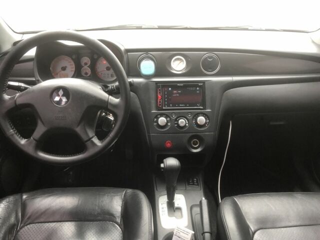 Чорний Міцубісі Аутлендер, об'ємом двигуна 2.4 л та пробігом 314 тис. км за 5000 $, фото 6 на Automoto.ua