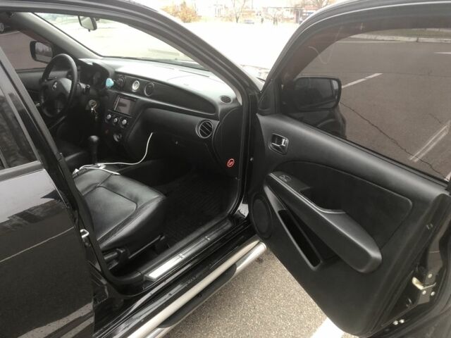 Чорний Міцубісі Аутлендер, об'ємом двигуна 2.4 л та пробігом 314 тис. км за 5000 $, фото 3 на Automoto.ua