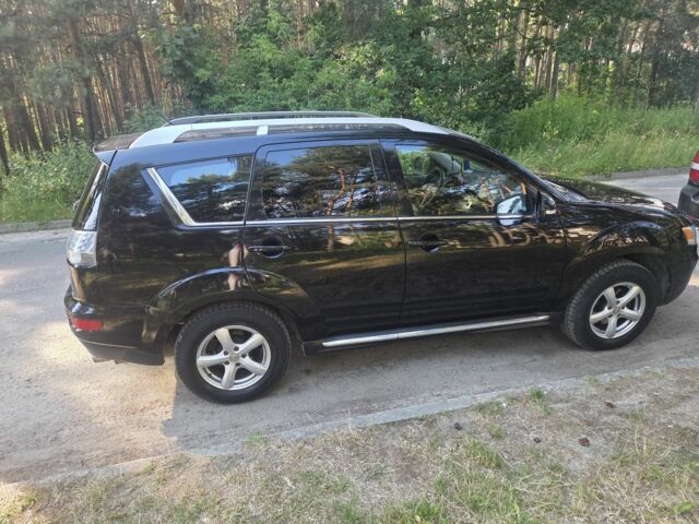 Чорний Міцубісі Аутлендер, об'ємом двигуна 2 л та пробігом 247 тис. км за 9600 $, фото 1 на Automoto.ua