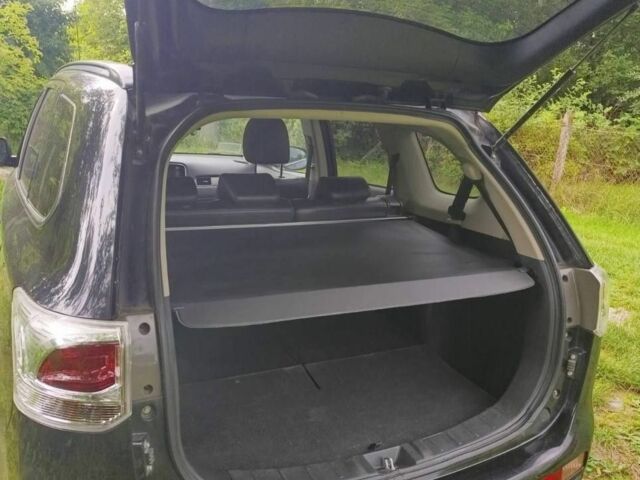 Чорний Міцубісі Аутлендер, об'ємом двигуна 2.3 л та пробігом 220 тис. км за 340 $, фото 16 на Automoto.ua