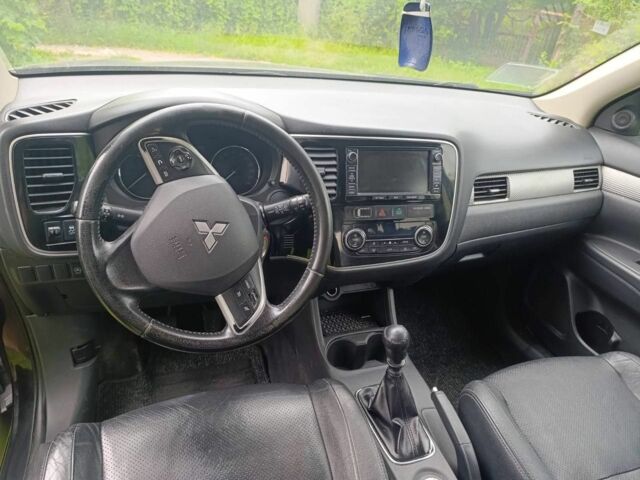 Чорний Міцубісі Аутлендер, об'ємом двигуна 2.3 л та пробігом 220 тис. км за 340 $, фото 4 на Automoto.ua