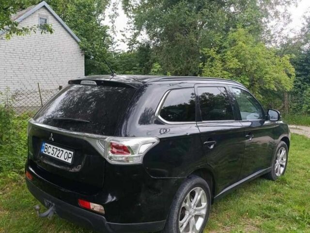 Чорний Міцубісі Аутлендер, об'ємом двигуна 2.3 л та пробігом 220 тис. км за 340 $, фото 3 на Automoto.ua