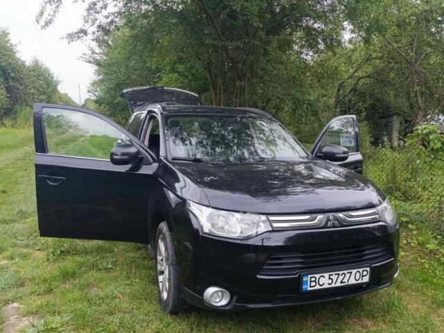 Чорний Міцубісі Аутлендер, об'ємом двигуна 2.3 л та пробігом 220 тис. км за 340 $, фото 2 на Automoto.ua