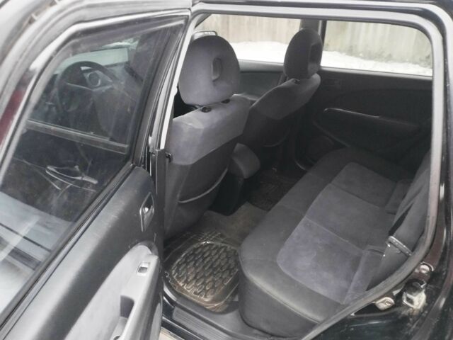 Чорний Міцубісі Аутлендер, об'ємом двигуна 2 л та пробігом 251 тис. км за 4990 $, фото 8 на Automoto.ua