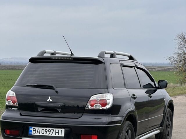 Чорний Міцубісі Аутлендер, об'ємом двигуна 2 л та пробігом 230 тис. км за 6300 $, фото 2 на Automoto.ua
