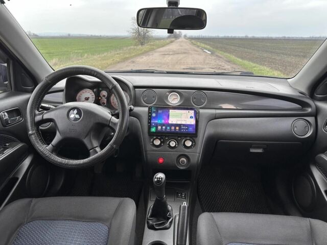 Чорний Міцубісі Аутлендер, об'ємом двигуна 2 л та пробігом 230 тис. км за 6300 $, фото 5 на Automoto.ua