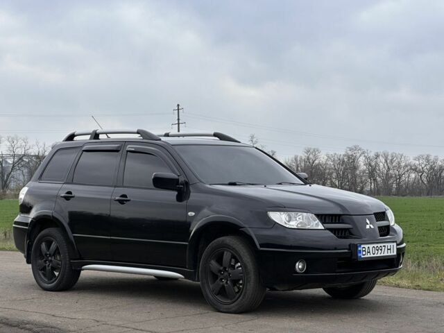 Чорний Міцубісі Аутлендер, об'ємом двигуна 2 л та пробігом 230 тис. км за 6300 $, фото 3 на Automoto.ua
