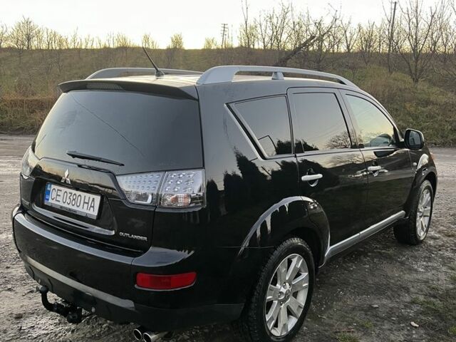 Черный Мицубиси Аутлендер, объемом двигателя 2.2 л и пробегом 238 тыс. км за 9700 $, фото 4 на Automoto.ua