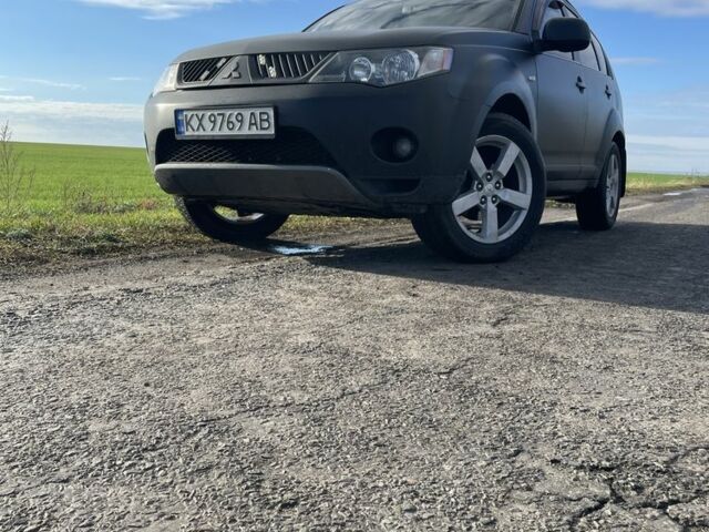Чорний Міцубісі Аутлендер, об'ємом двигуна 2.4 л та пробігом 260 тис. км за 10000 $, фото 5 на Automoto.ua