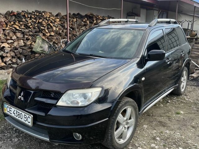 Черный Мицубиси Аутлендер, объемом двигателя 2 л и пробегом 156 тыс. км за 4200 $, фото 14 на Automoto.ua
