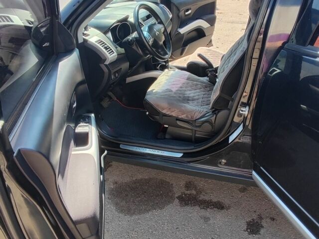 Чорний Міцубісі Аутлендер, об'ємом двигуна 2.4 л та пробігом 180 тис. км за 9000 $, фото 11 на Automoto.ua