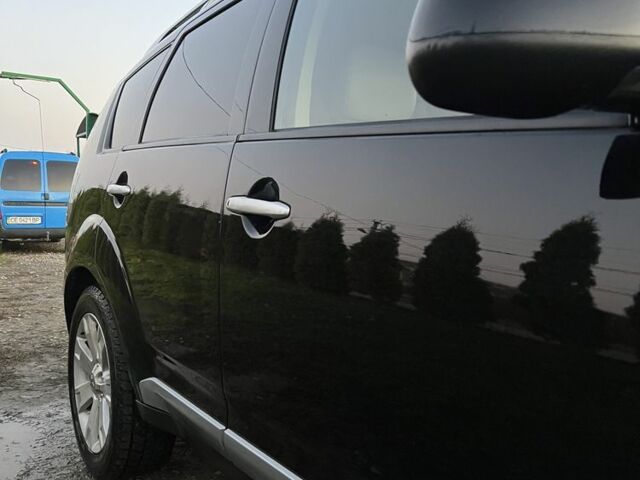 Черный Мицубиси Аутлендер, объемом двигателя 2.2 л и пробегом 238 тыс. км за 9700 $, фото 21 на Automoto.ua