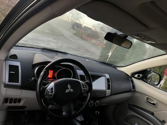 Черный Мицубиси Аутлендер, объемом двигателя 2.2 л и пробегом 238 тыс. км за 9700 $, фото 18 на Automoto.ua