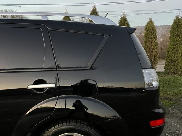 Черный Мицубиси Аутлендер, объемом двигателя 2.2 л и пробегом 238 тыс. км за 9700 $, фото 13 на Automoto.ua