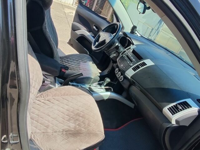 Чорний Міцубісі Аутлендер, об'ємом двигуна 2.4 л та пробігом 180 тис. км за 9000 $, фото 13 на Automoto.ua