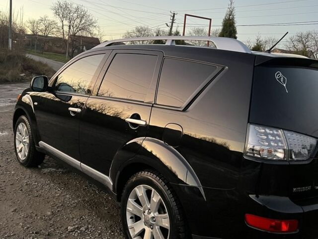 Черный Мицубиси Аутлендер, объемом двигателя 2.2 л и пробегом 238 тыс. км за 9700 $, фото 14 на Automoto.ua