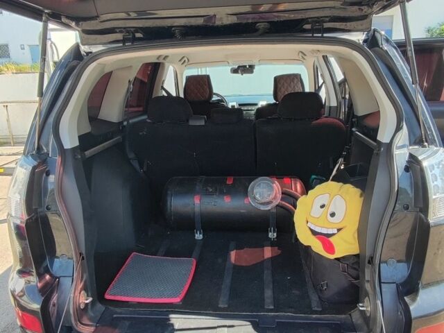 Чорний Міцубісі Аутлендер, об'ємом двигуна 2.4 л та пробігом 180 тис. км за 9000 $, фото 16 на Automoto.ua