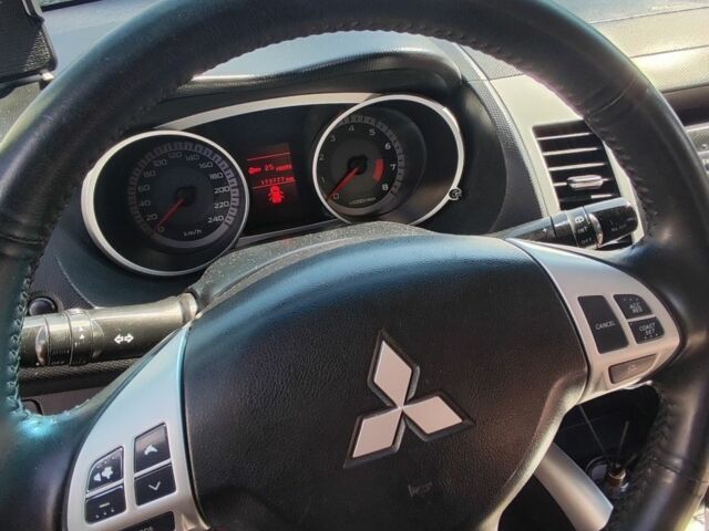 Чорний Міцубісі Аутлендер, об'ємом двигуна 2.4 л та пробігом 180 тис. км за 9000 $, фото 9 на Automoto.ua