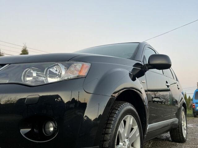Черный Мицубиси Аутлендер, объемом двигателя 2.2 л и пробегом 238 тыс. км за 9700 $, фото 2 на Automoto.ua