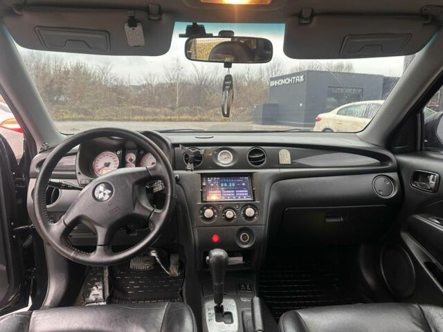 Черный Мицубиси Аутлендер, объемом двигателя 2.4 л и пробегом 244 тыс. км за 6800 $, фото 4 на Automoto.ua