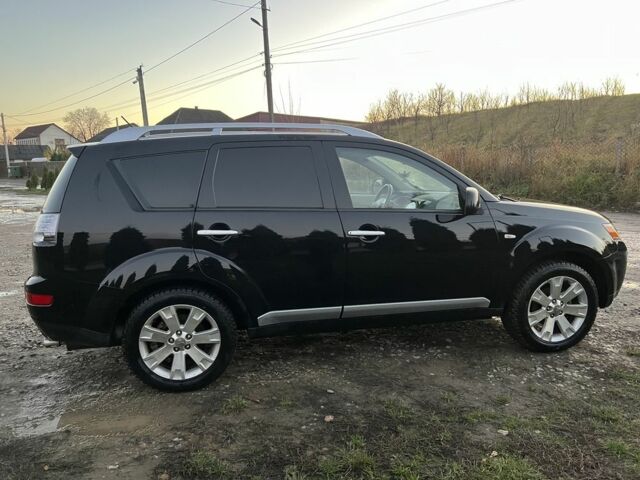 Черный Мицубиси Аутлендер, объемом двигателя 2.2 л и пробегом 238 тыс. км за 9700 $, фото 8 на Automoto.ua