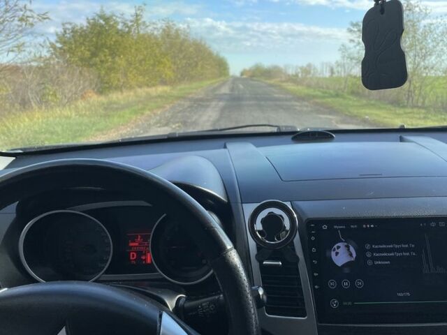 Чорний Міцубісі Аутлендер, об'ємом двигуна 2.4 л та пробігом 260 тис. км за 10000 $, фото 4 на Automoto.ua