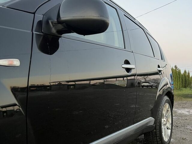 Черный Мицубиси Аутлендер, объемом двигателя 2.2 л и пробегом 238 тыс. км за 9700 $, фото 3 на Automoto.ua