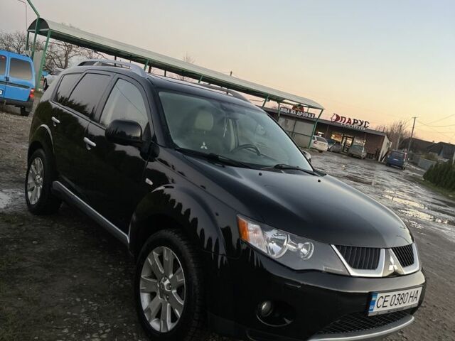 Черный Мицубиси Аутлендер, объемом двигателя 2.2 л и пробегом 238 тыс. км за 9700 $, фото 5 на Automoto.ua