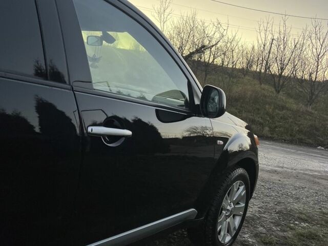 Черный Мицубиси Аутлендер, объемом двигателя 2.2 л и пробегом 238 тыс. км за 9700 $, фото 7 на Automoto.ua