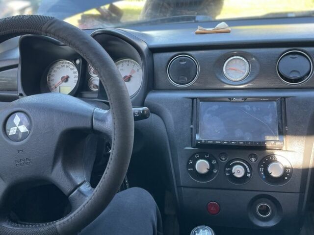 Черный Мицубиси Аутлендер, объемом двигателя 2 л и пробегом 156 тыс. км за 4200 $, фото 10 на Automoto.ua