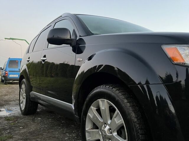 Черный Мицубиси Аутлендер, объемом двигателя 2.2 л и пробегом 238 тыс. км за 9700 $, фото 6 на Automoto.ua