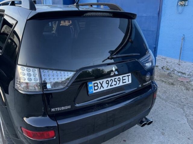 Черный Мицубиси Аутлендер, объемом двигателя 2.4 л и пробегом 220 тыс. км за 9500 $, фото 3 на Automoto.ua