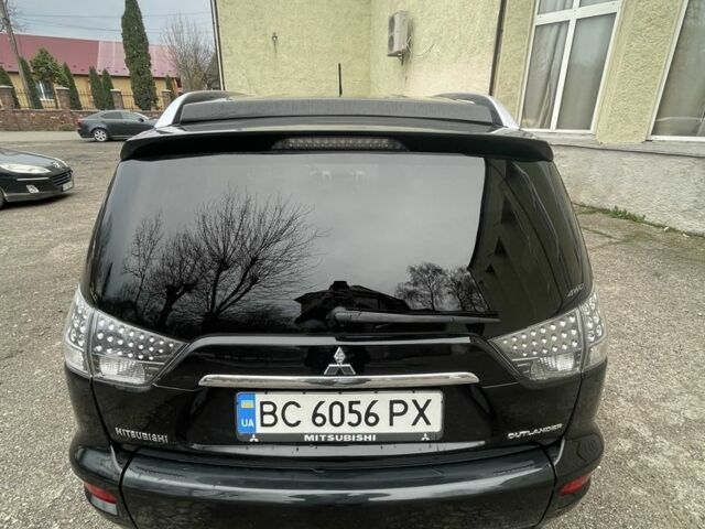 Черный Мицубиси Аутлендер, объемом двигателя 2.2 л и пробегом 186 тыс. км за 11200 $, фото 2 на Automoto.ua