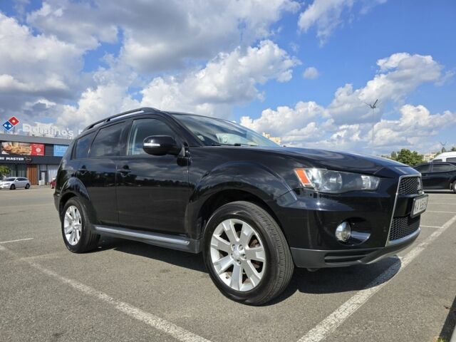 Чорний Міцубісі Аутлендер, об'ємом двигуна 2.4 л та пробігом 261 тис. км за 10700 $, фото 7 на Automoto.ua