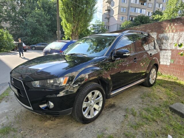 Чорний Міцубісі Аутлендер, об'ємом двигуна 2.4 л та пробігом 261 тис. км за 10700 $, фото 4 на Automoto.ua